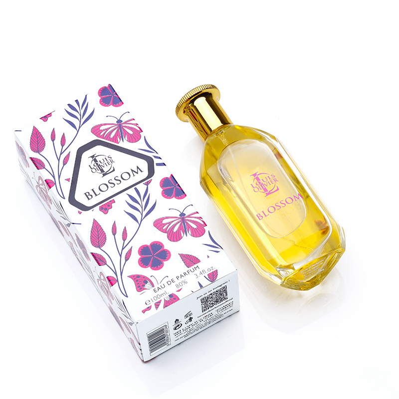 Perfume bottle and packaging with 'Blossom' branding on a white background. House Of Perfumes India