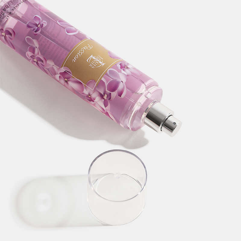 Pink bottle with floral design and a glass on a white background Blossom-Gift-Set - House Of Perfumes India