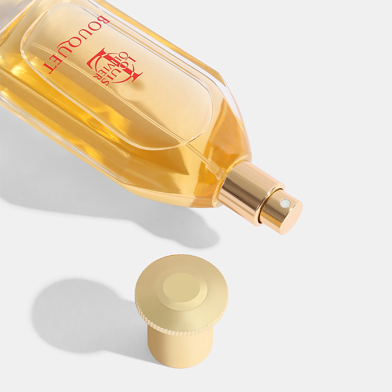 Perfume bottle with gold cap on a light gray background  Bouquet-Gift-Set House of Perfumes India