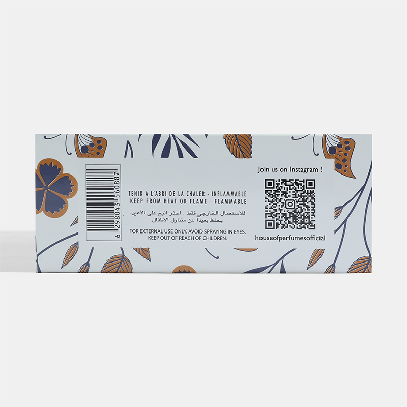 Product label with floral design, barcode, and QR code on a light gray background Candy-Gift-Set House of Perfumes India