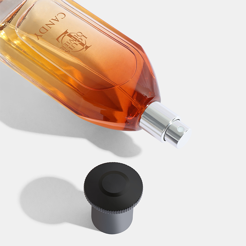 Perfume bottle with a black cap on a light gray background Candy-Gift-Set House of perfumes India