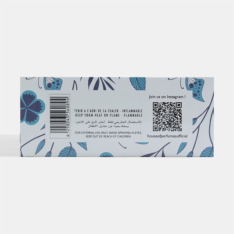 Product packaging with floral design, barcode, and QR code on a light gray background Crystal-Gift-Set House of perfumes India