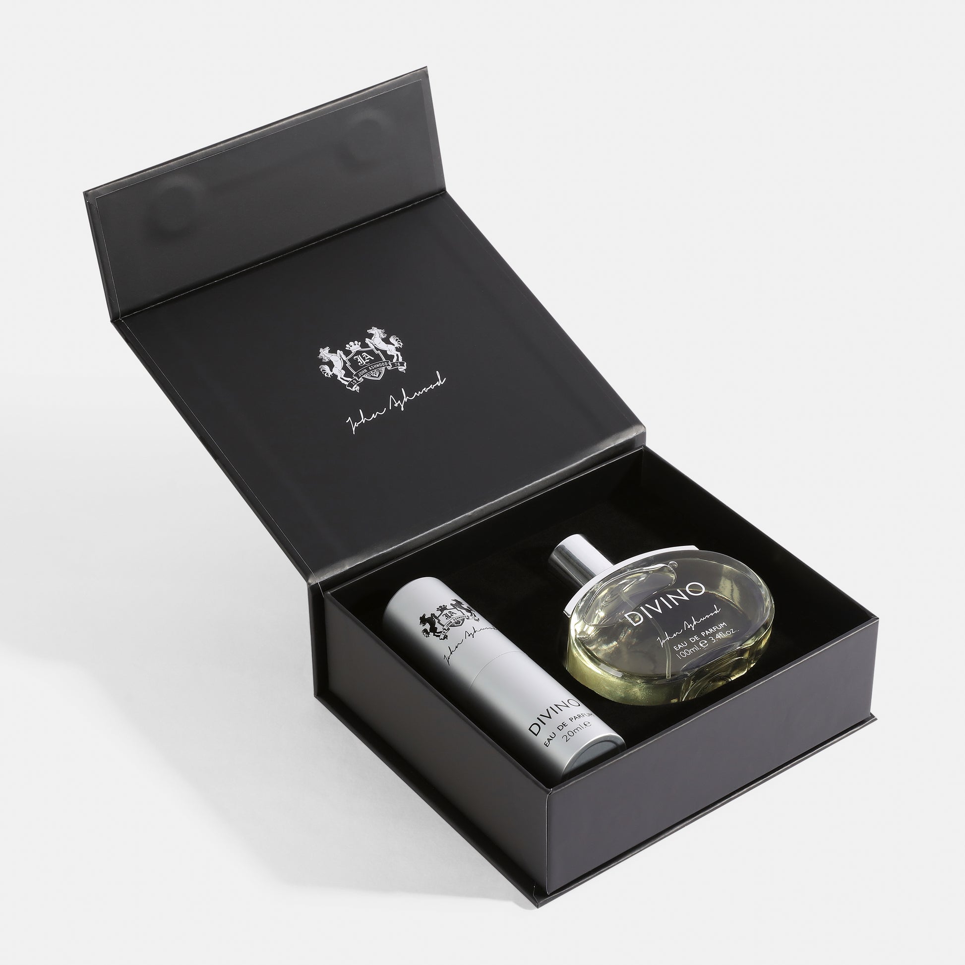 Two bottles of 'DIVINO' in a black branded box on a white background