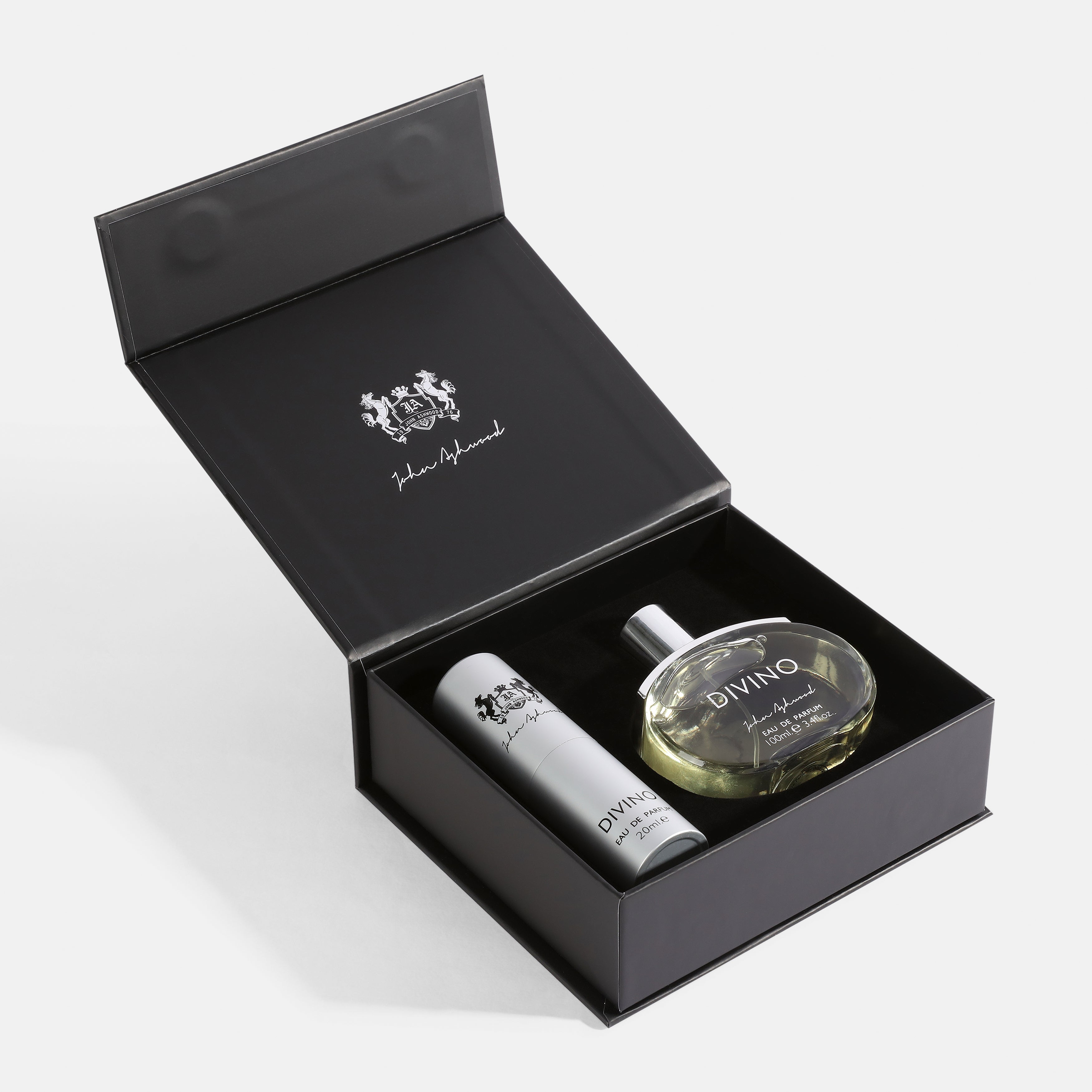 Two bottles of 'DIVINO' in a black branded box on a white background