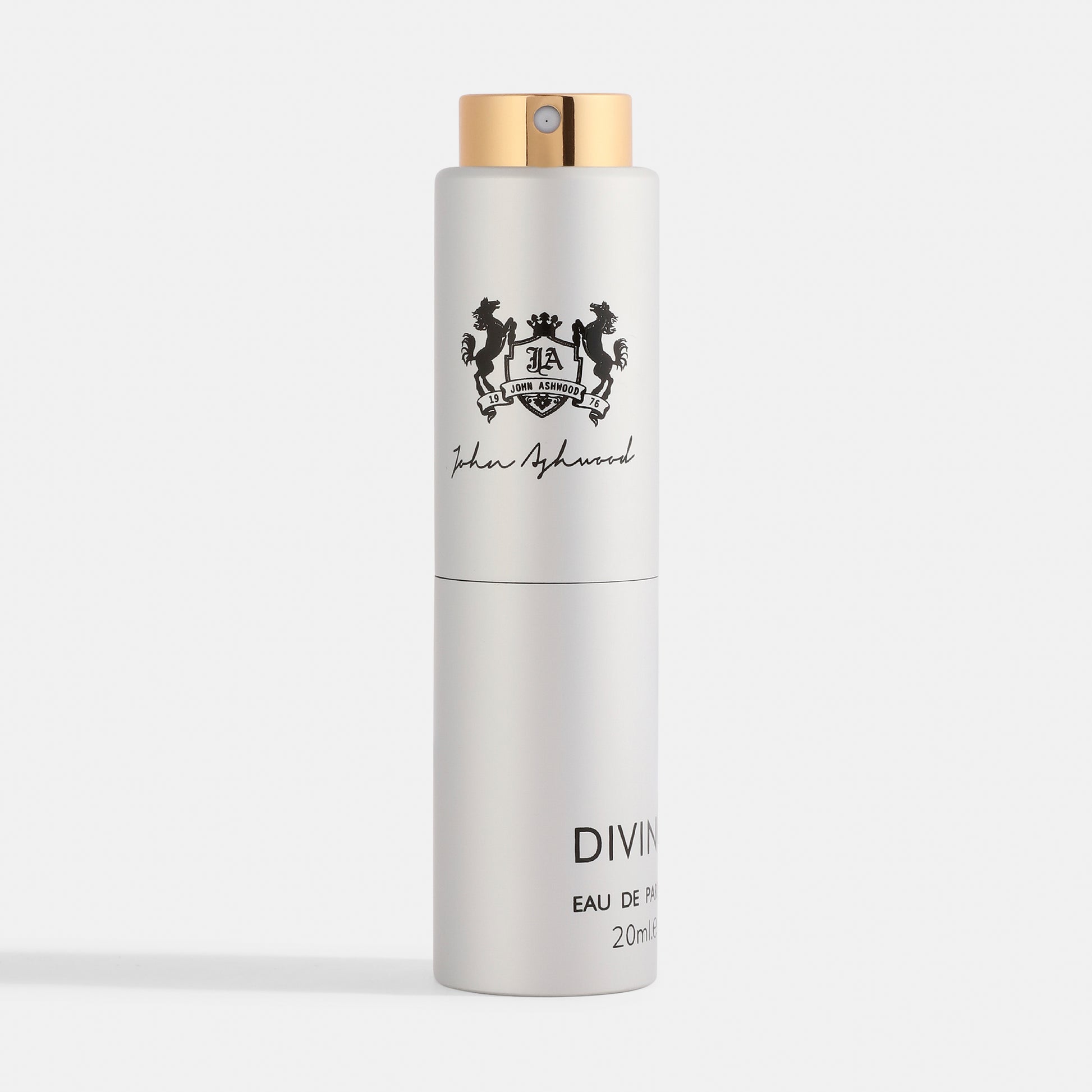 Divino White perfume bottle with gold cap on a white background