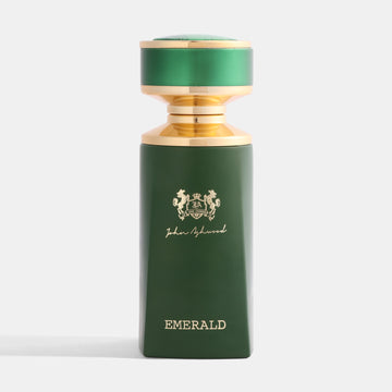EMERALD Green perfume bottle with gold cap on a white background