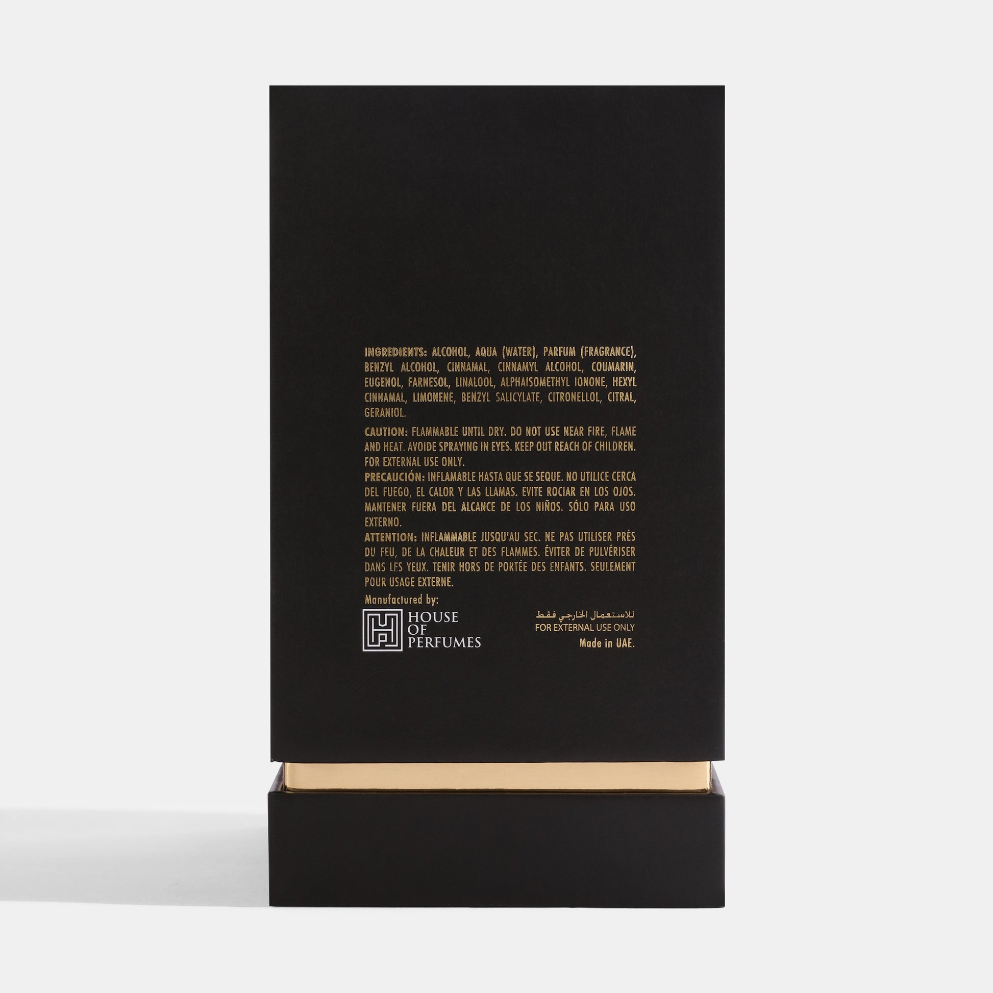 EMERALD Black perfume bottle packaging with gold text on a white background
