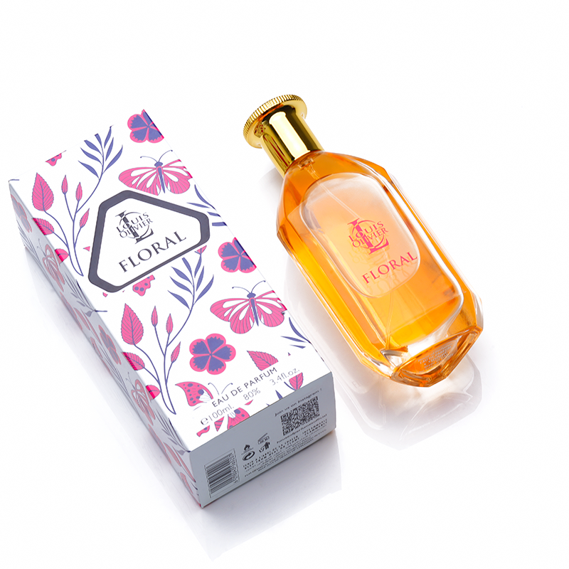 Floral Perfume bottle and packaging with floral design on a white background