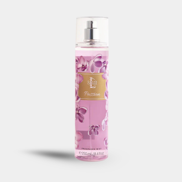A bottle of Passion body spray with a pink floral design and a gold label, shown on a light gray background.