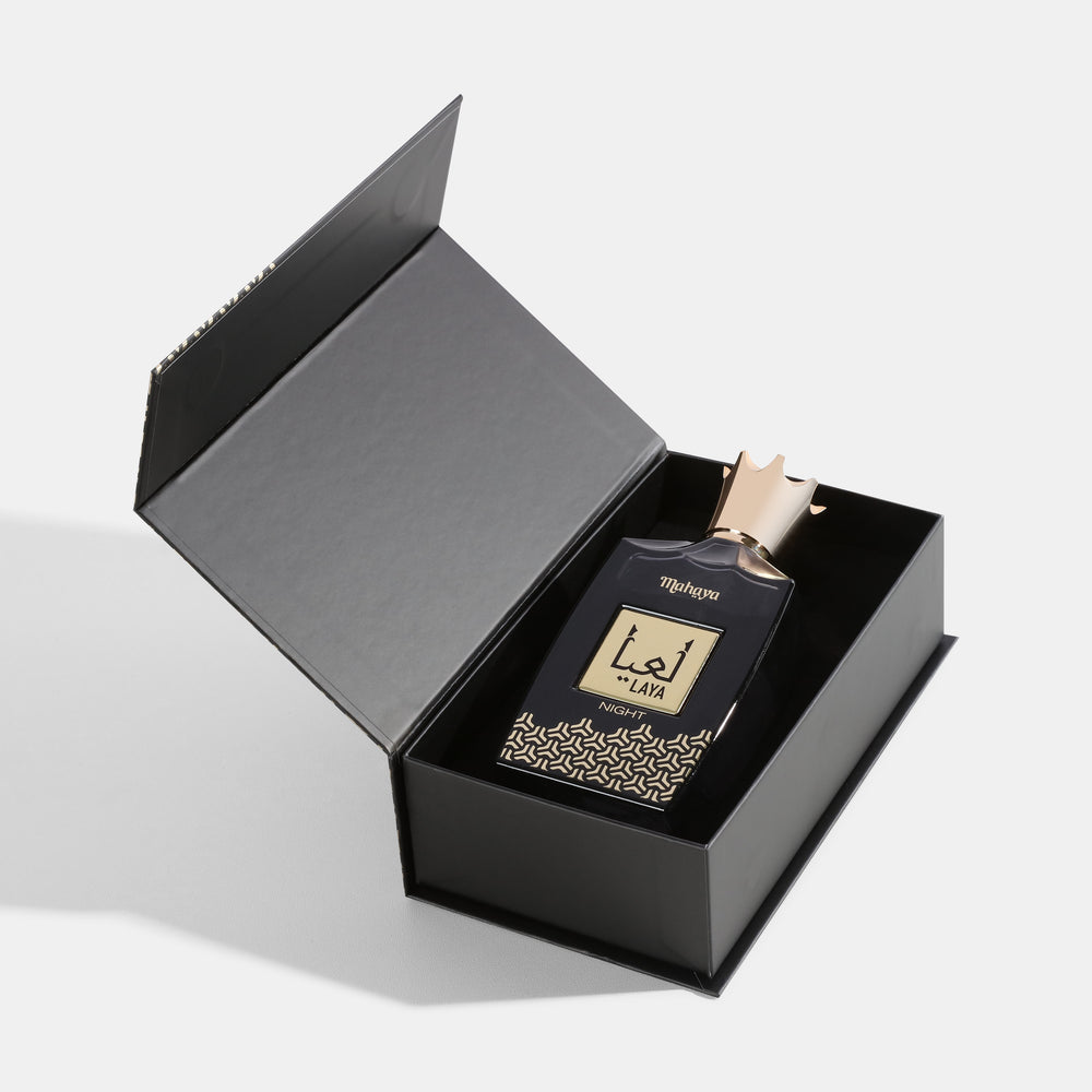 Laya Night Perfume bottle with gold cap in an open black box on a light gray background. House Of Perfumes India
