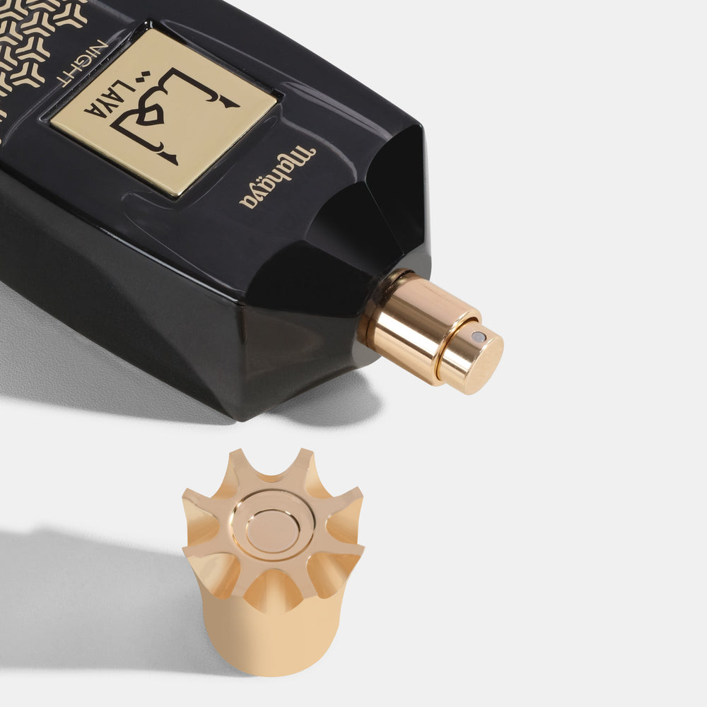 Laya Night perfume bottle with a star-shaped cap on a light gray background. House Of Perfumes India