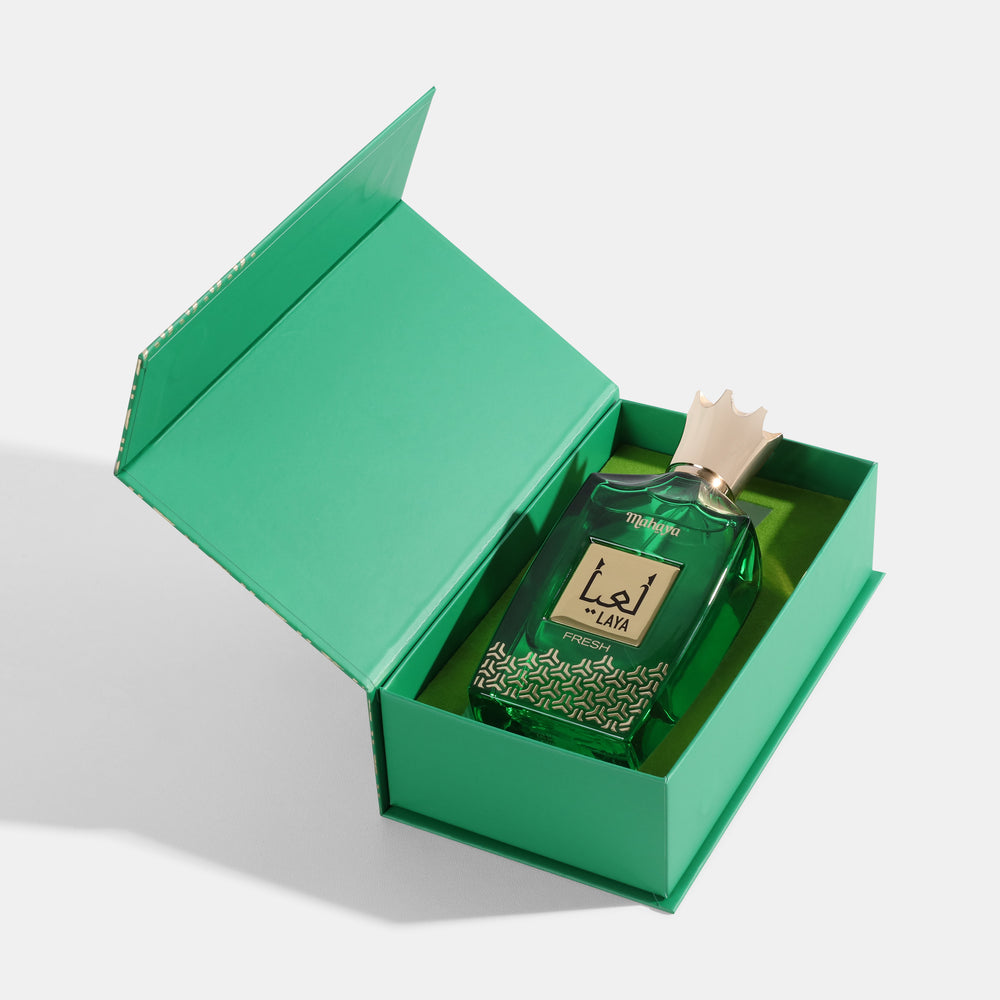 Laya Fresh Green perfume bottle with decorative box on a light gray background. House Of Perfumes India