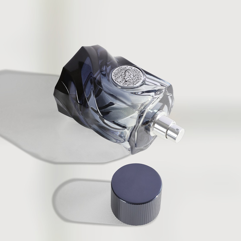 Niyamat Blu Perfume bottle with a dark cap on a light gray background. House Of Perfumes India