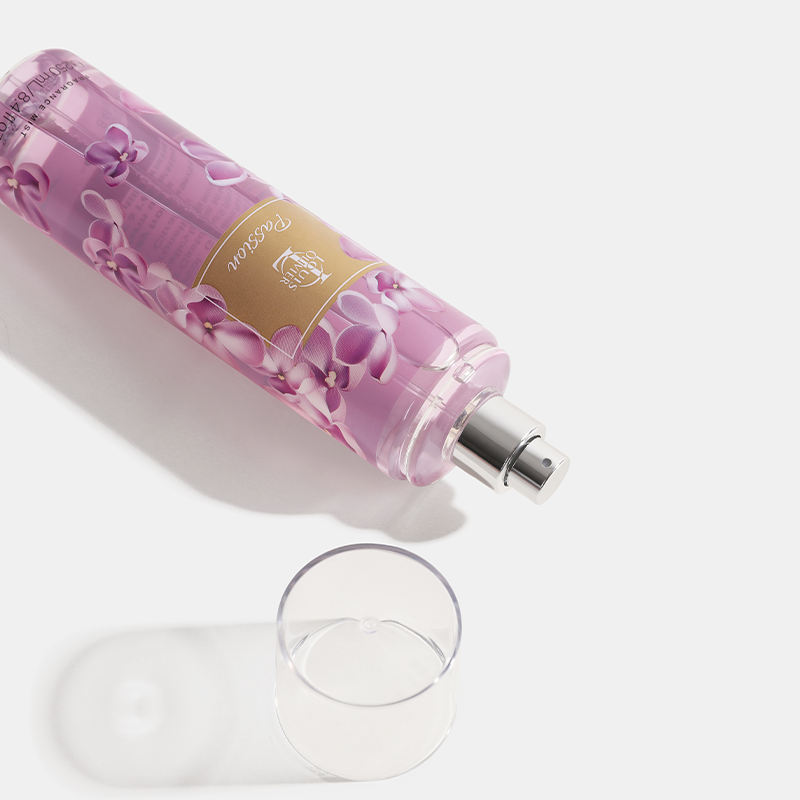 Passion Pink floral-patterned bottle with a glass on a white background. House Of Perfumes India