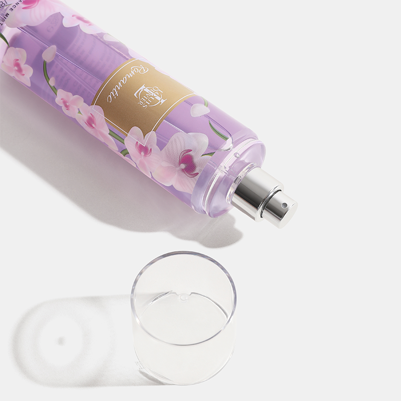 Lavender bottle with floral design on a white background. Pretty-Gift-Set House of perfumes India