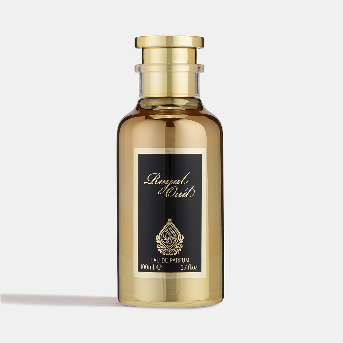 A gold-colored bottle of 'Royal Oud' cologne with a black label and a golden cap.