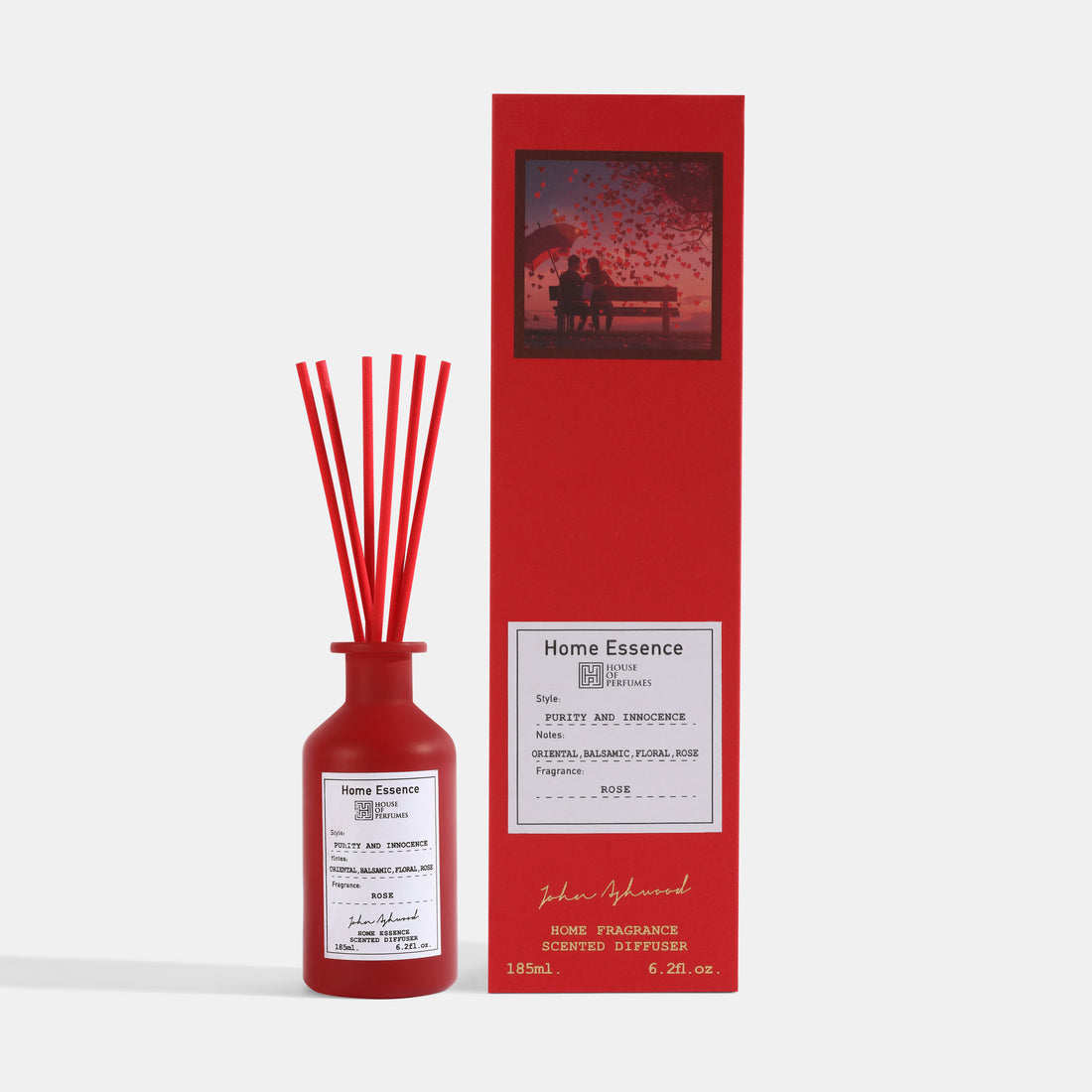 Red Home Essence diffuser bottle with packaging on a white background