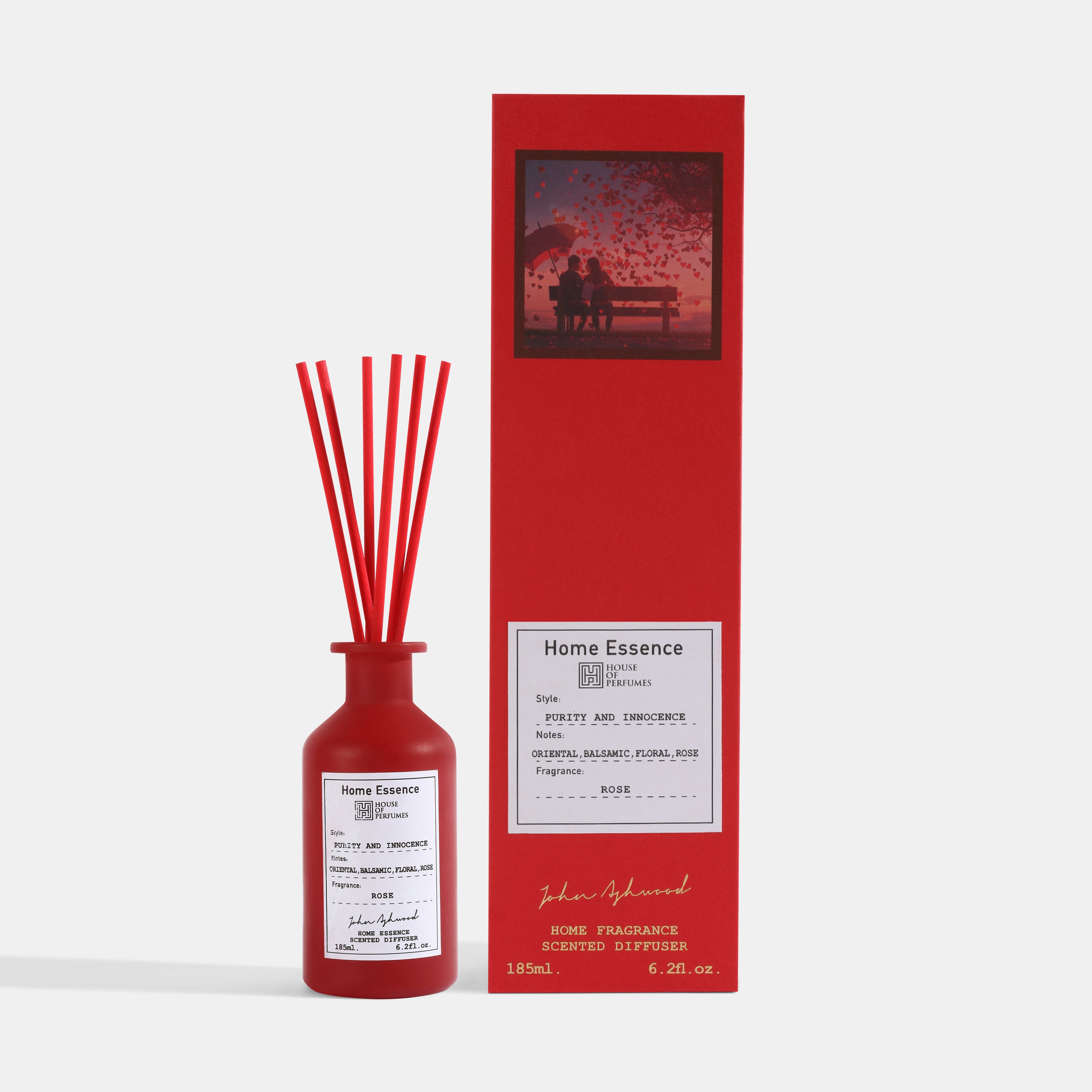 Red Home Essence diffuser bottle with packaging on a white background