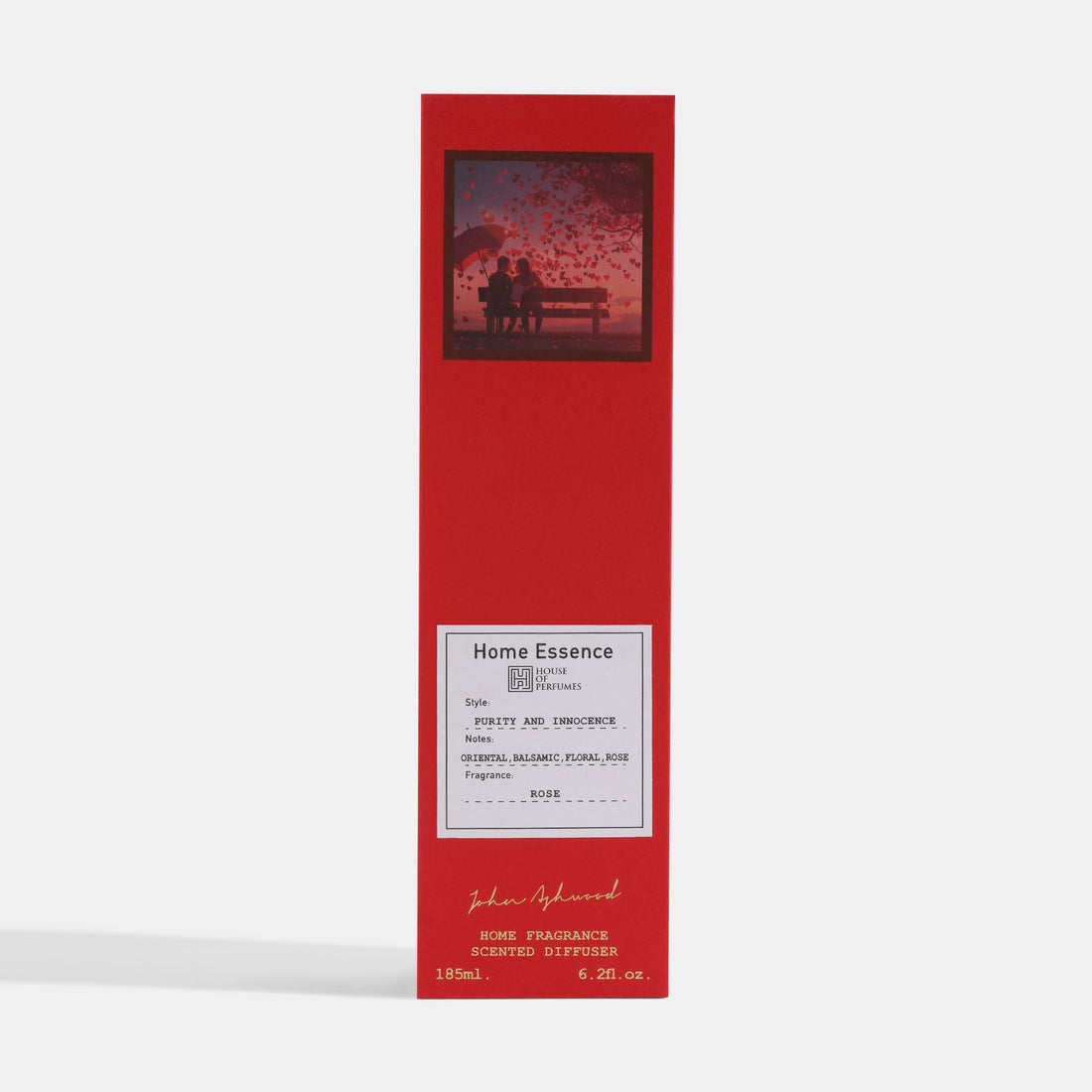 Red Home Essence diffuser bottle with packaging on a white background