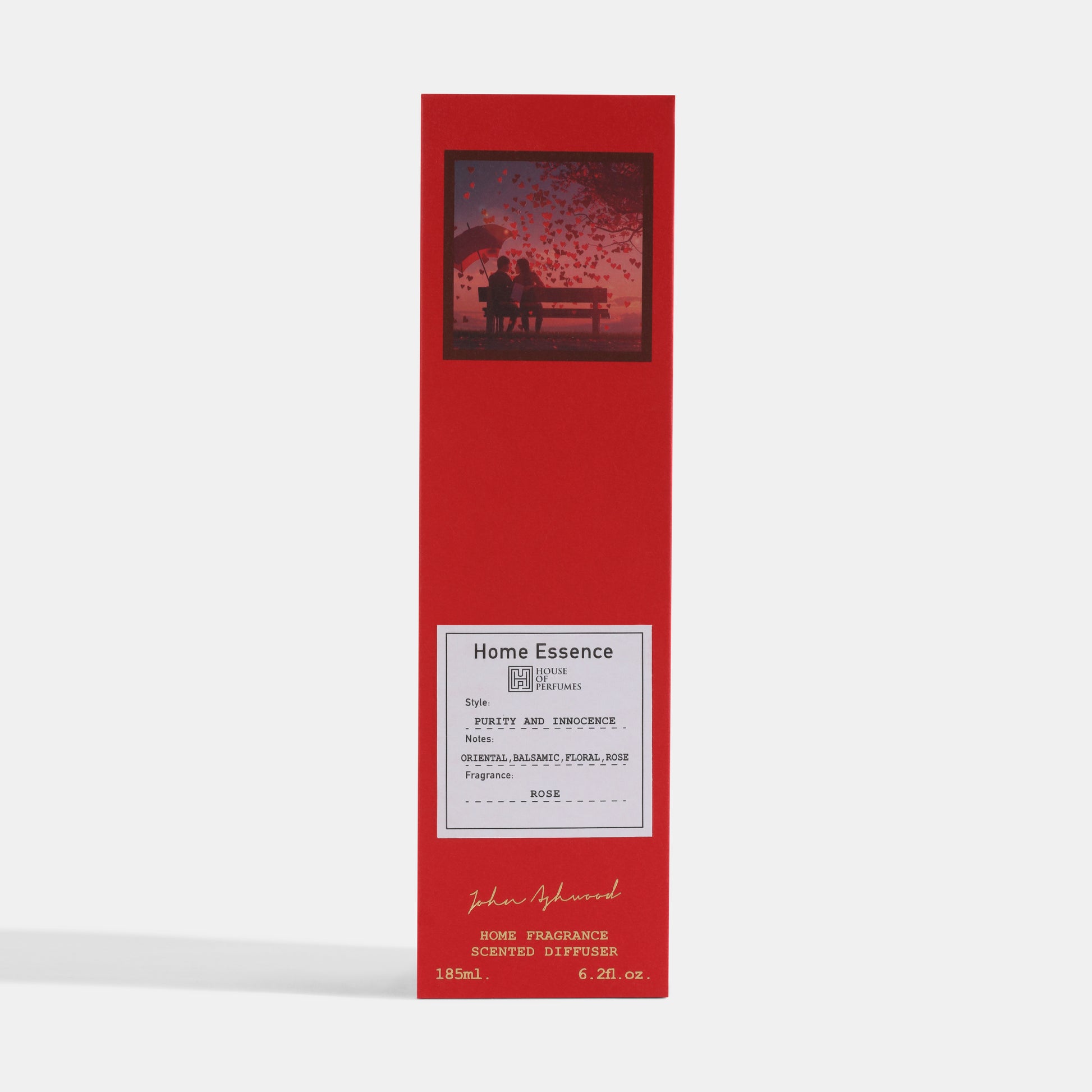 Red Home Essence diffuser packaging with a silhouette of a couple on a bench.