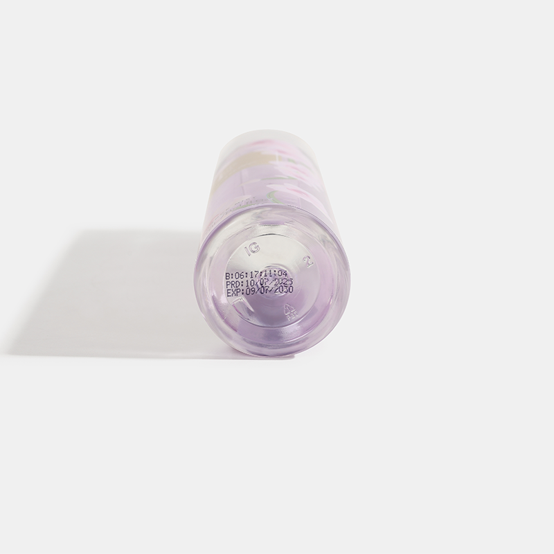Romantic Purple cylindrical container with a label on a white background. House Of Perfumes India