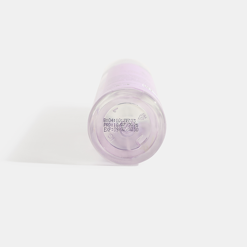 Secret Kiss Close-up of a purple container with text on a white background. House Of Perfumes India