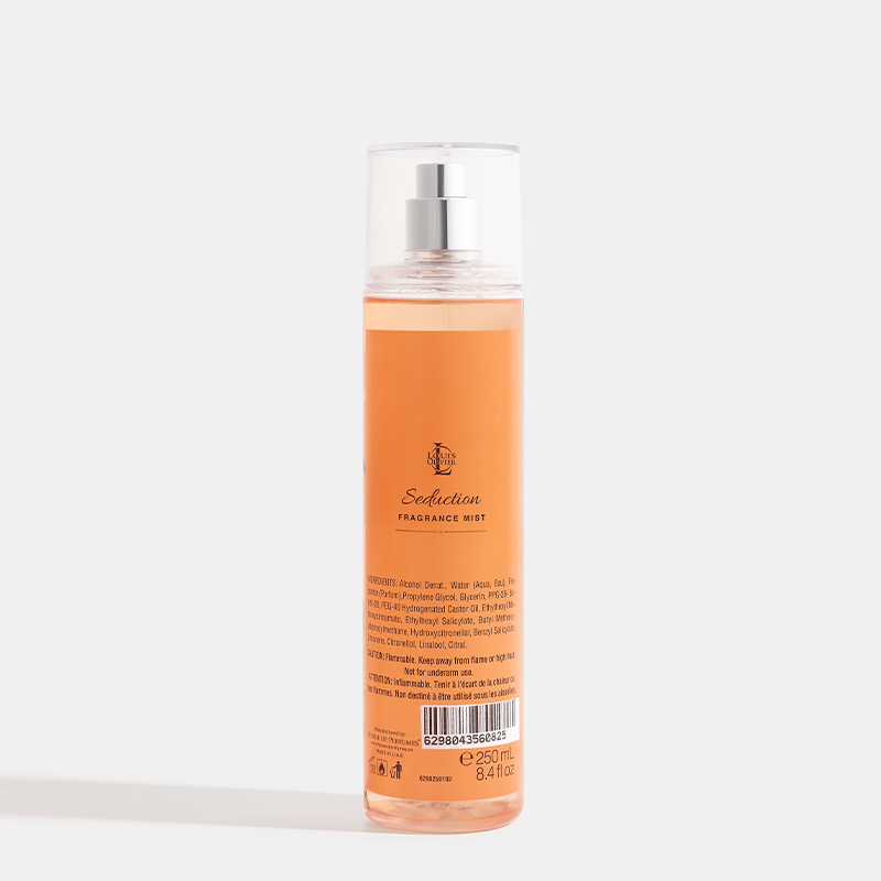 Seduction Orange spray bottle with silver cap on a white background. House Of Perfumes India